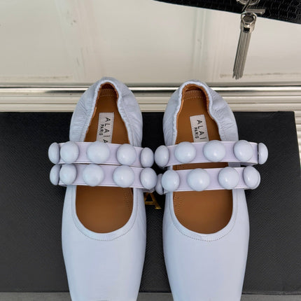 ALAIA MARY JANE PEARL IN PALE PURPLE GLOSSY LAMBSKIN