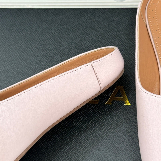 ALAIA FLAT MULE IN LIGHT PINK LAMBSKIN