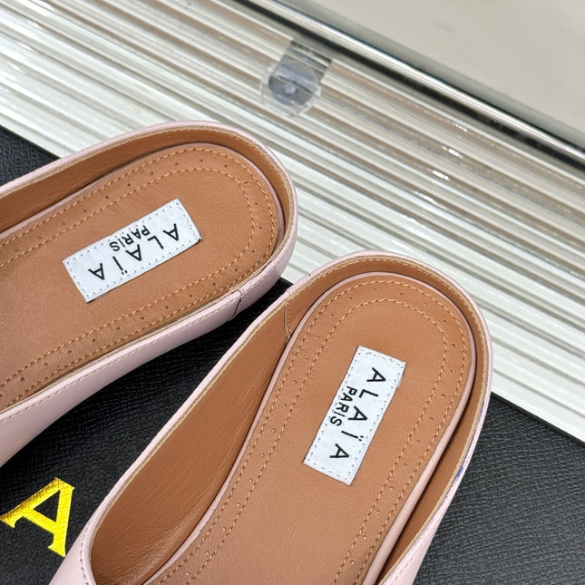 ALAIA FLAT MULE IN LIGHT PINK LAMBSKIN