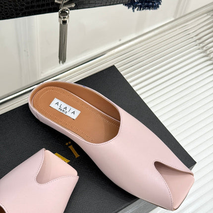 ALAIA FLAT MULE IN LIGHT PINK LAMBSKIN