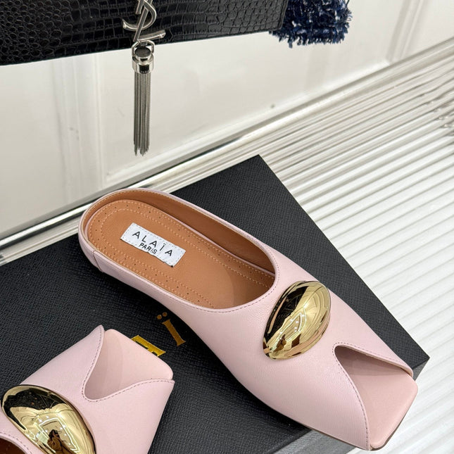 ALAIA FLAT MULE IN LIGHT PINK LAMBSKIN WITH GOLD HARDWARE