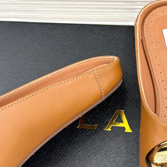 ALAIA FLAT MULE IN BRONZE BROWN LAMBSKIN WITH GOLD HARDWARE