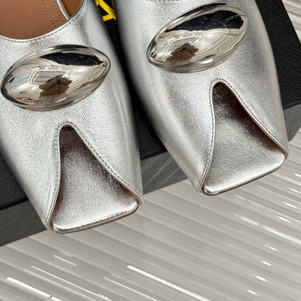 ALAIA FLAT MULE IN SILVER LAMBSKIN WITH SILVER HARDWARE
