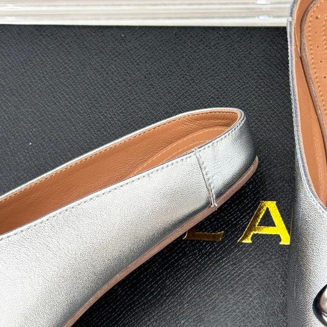 ALAIA FLAT MULE IN SILVER LAMBSKIN WITH SILVER HARDWARE