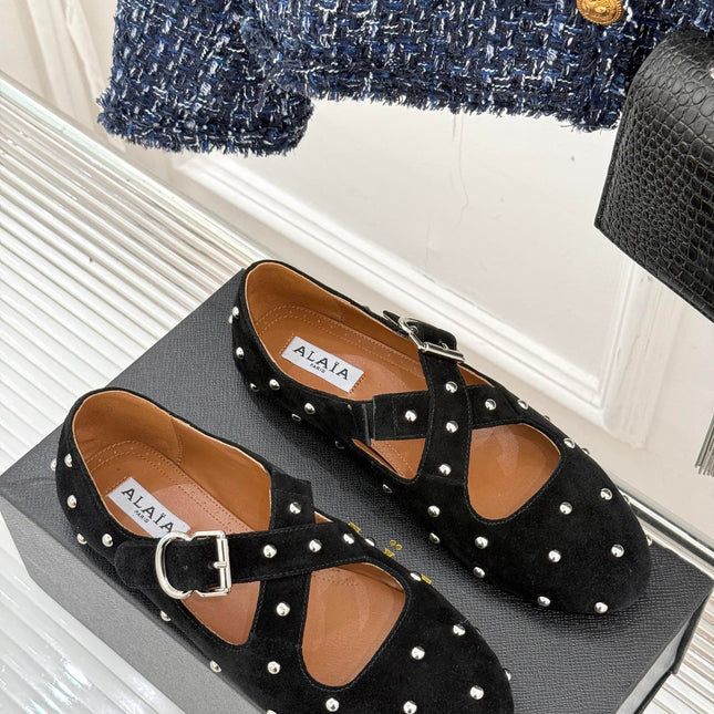 CROSSED STRAP BALLET FLATS IN BLACK SUEDE