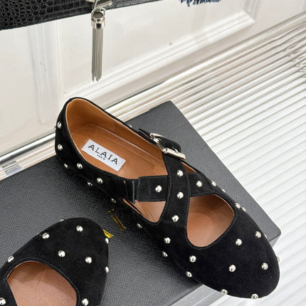 CROSSED STRAP BALLET FLATS IN BLACK SUEDE