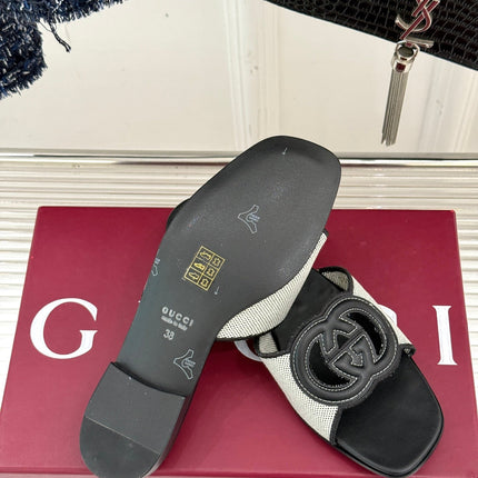 SLIDE SANDALS IN BLACK AND WHITE CALFSKIN