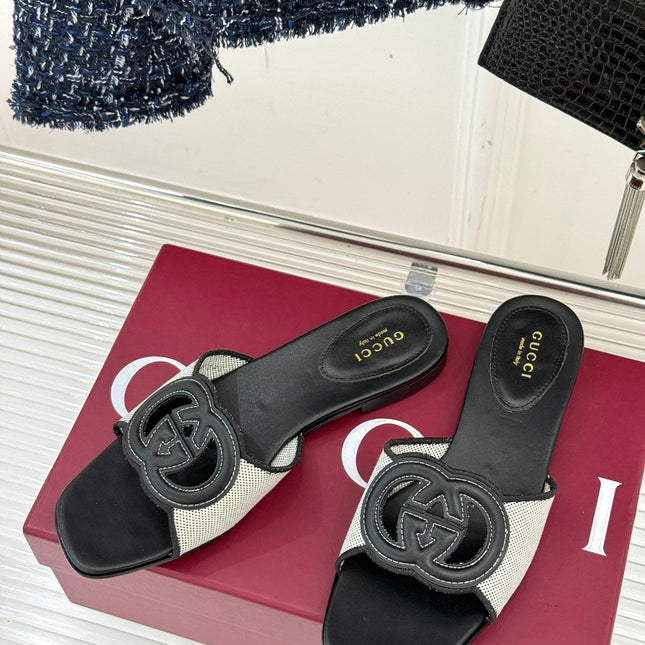 SLIDE SANDALS IN BLACK AND WHITE CALFSKIN