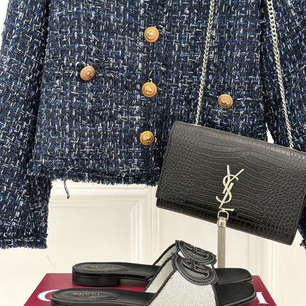 SLIDE SANDALS IN BLACK AND WHITE CALFSKIN