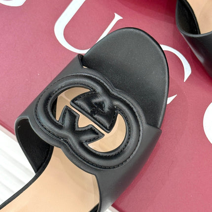 MID-HEEL MULE IN BLACK CALFSKIN