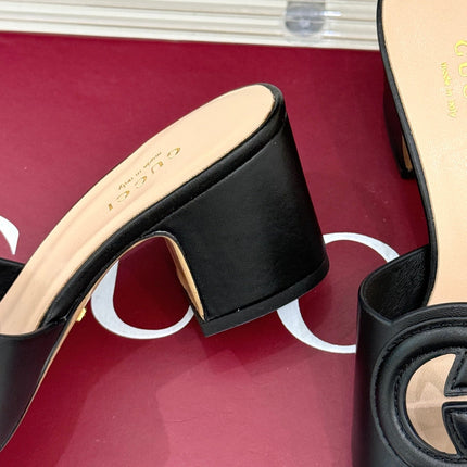 MID-HEEL MULE IN BLACK CALFSKIN