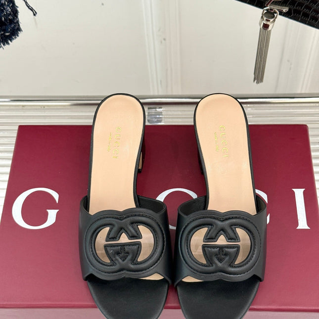 MID-HEEL MULE IN BLACK CALFSKIN