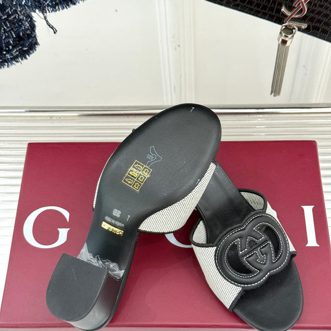 MID-HEEL MULE IN BLACK CALFSKIN AND CREAM WHITE FABRIC