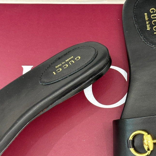 SLIDE SANDALS IN BLACK CALFSKIN WITH GOLD HARDWARE