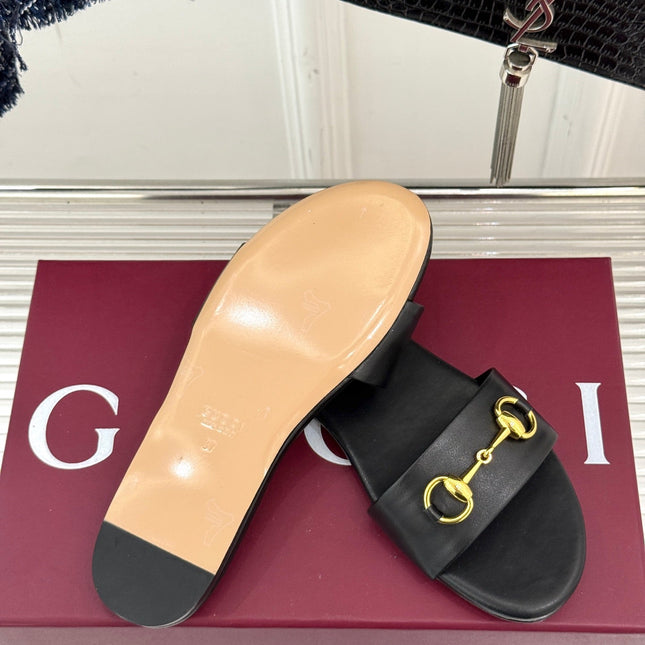 SLIDE SANDALS IN BLACK CALFSKIN WITH GOLD HARDWARE