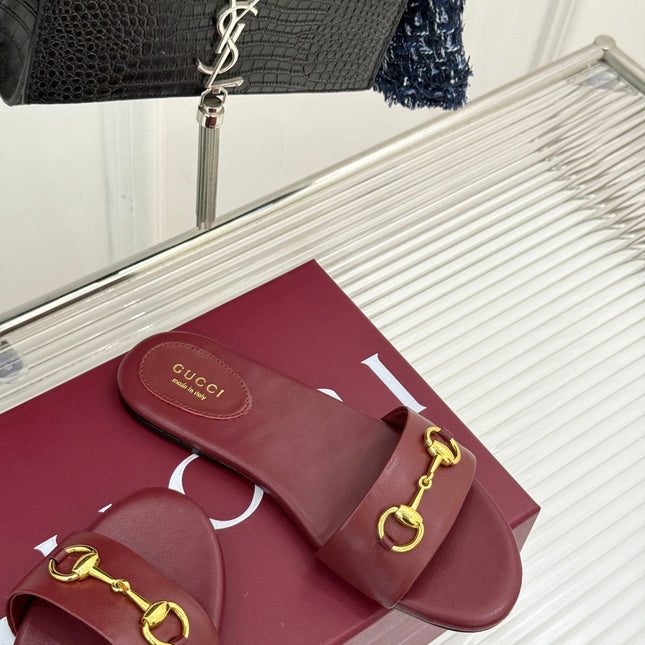 SLIDE SANDALS IN RED CALFSKIN WITH GOLD HARDWARE