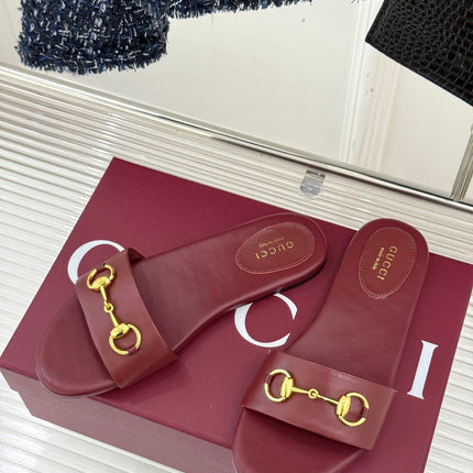 SLIDE SANDALS IN RED CALFSKIN WITH GOLD HARDWARE