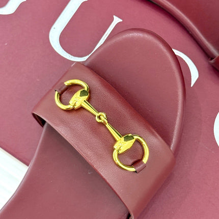 SLIDE SANDALS IN RED CALFSKIN WITH GOLD HARDWARE