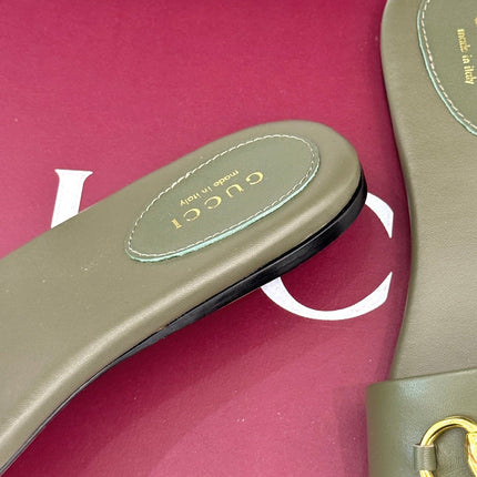 SLIDE SANDALS IN MOSS GREEN CALFSKIN WITH GOLD HARDWARE