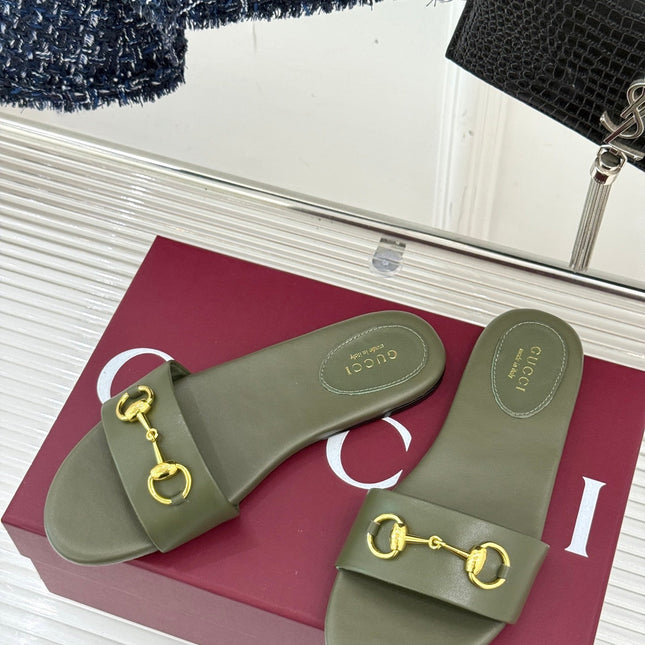 SLIDE SANDALS IN MOSS GREEN CALFSKIN WITH GOLD HARDWARE