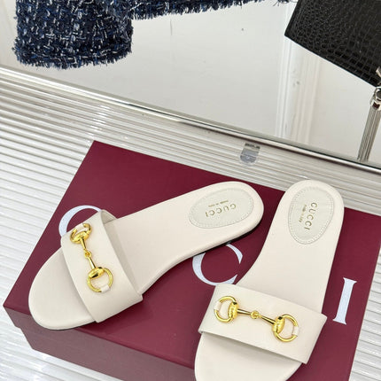 SLIDE SANDALS IN WHITE CALFSKIN WITH GOLD HARDWARE