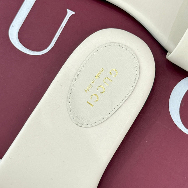 SLIDE SANDALS IN WHITE CALFSKIN WITH GOLD HARDWARE