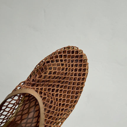 ALAIA FLAT MULES IN COPPER BROWN MESH FISHNET