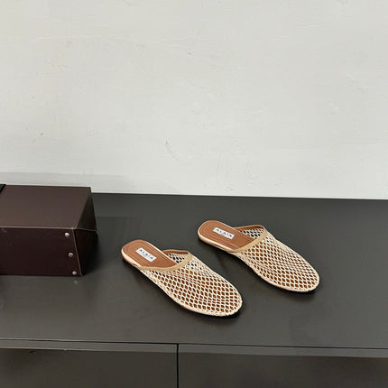ALAIA FLAT MULES IN BEIGE MESH FISHNET