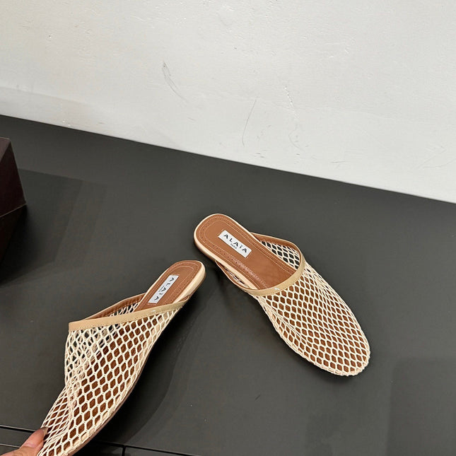 ALAIA FLAT MULES IN BEIGE MESH FISHNET
