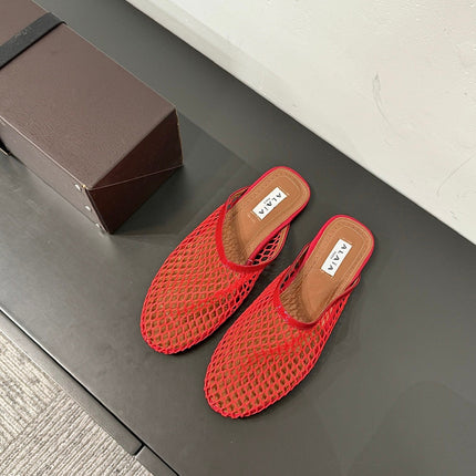 ALAIA FLAT MULES IN CHERRY RED MESH FISHNET