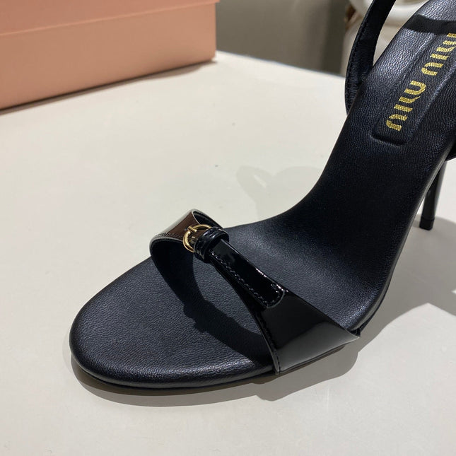 TWO STRAP HIGH HEELED SANDALS IN BLACK GLOSSY SHEEPSKIN