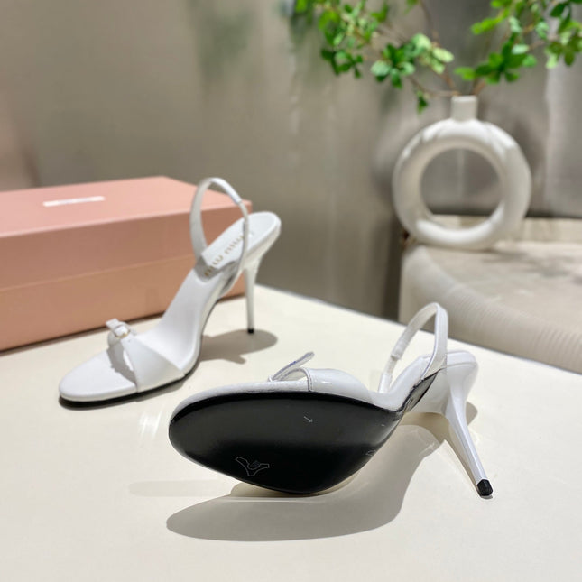 TWO STRAP HIGH HEELED SANDALS IN WHITE GLOSSY SHEEPSKIN