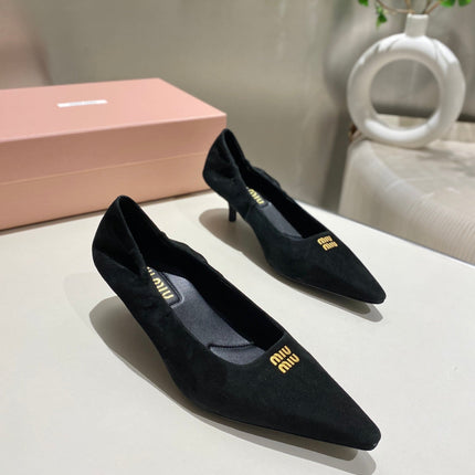 POINTED-TOE MID HEEL PUMPS IN BLACK SUEDE
