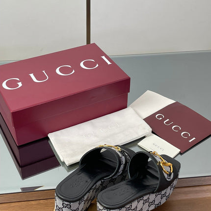 HIGH 6.3 CM WEDGE SANDALS IN BLACK CALFSKIN AND FABRIC