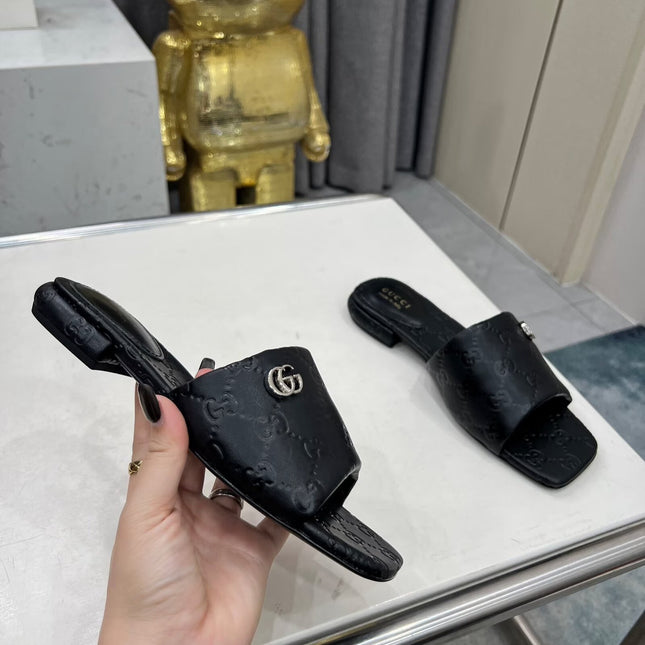 GG CASUAL SLIPPERS IN BLACK CALFSKIN LOGO EMBOSSING