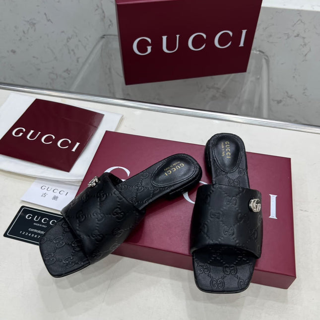 GG CASUAL SLIPPERS IN BLACK CALFSKIN LOGO EMBOSSING