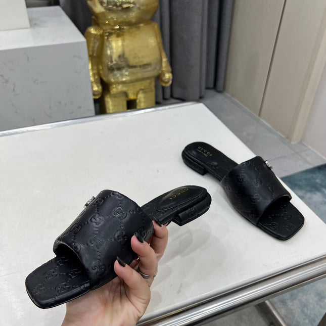 GG CASUAL SLIPPERS IN BLACK CALFSKIN LOGO EMBOSSING