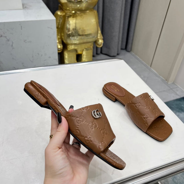 GG CASUAL SLIPPERS IN BROWN CALFSKIN LOGO EMBOSSING