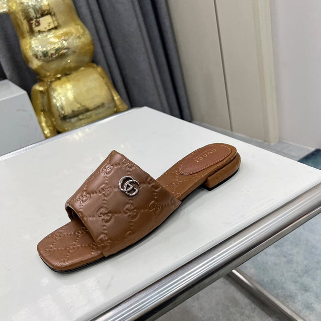 GG CASUAL SLIPPERS IN BROWN CALFSKIN LOGO EMBOSSING