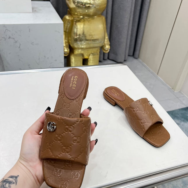 GG CASUAL SLIPPERS IN BROWN CALFSKIN LOGO EMBOSSING