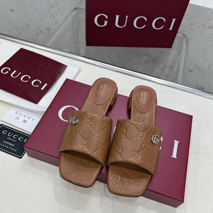 GG CASUAL SLIPPERS IN BROWN CALFSKIN LOGO EMBOSSING