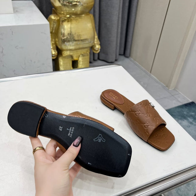 GG CASUAL SLIPPERS IN BROWN CALFSKIN LOGO EMBOSSING