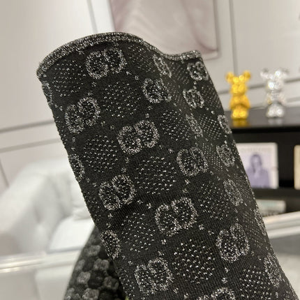 THIGH HIGH BOOTS IN BLACK KNITTED FABRIC