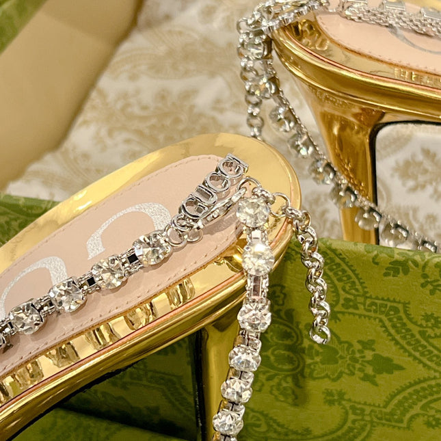 STRAPPY SANDAL WITH RHINESTONE CHAIN IN GOLD PATENT LEATHER