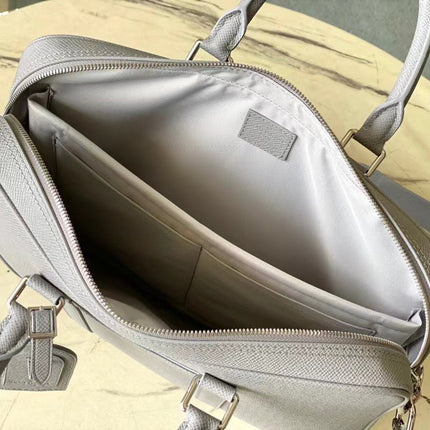 PORTE-DOCUMENTS VOYAGE PM 36 IN DOVE GRAY CALFSKIN