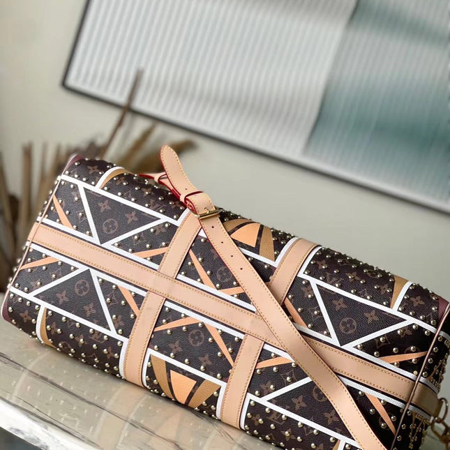 KEEPALL BANDOULIÈRE 50 IN PARFLECHE PATTERN MONOGRAM CANVAS