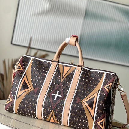 KEEPALL BANDOULIÈRE 50 IN PARFLECHE PATTERN MONOGRAM CANVAS