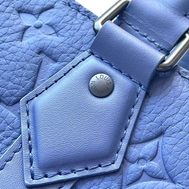 SAC PLAT 24H 41 IN SAPPHIRE BLUE MONOGRAM EMBOSSED TAURILLON