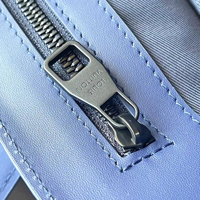 SAC PLAT 24H 41 IN SAPPHIRE BLUE MONOGRAM EMBOSSED TAURILLON