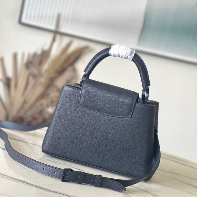 CAPUCINES EAST-WEST 27 IN BLACK TAURILLON